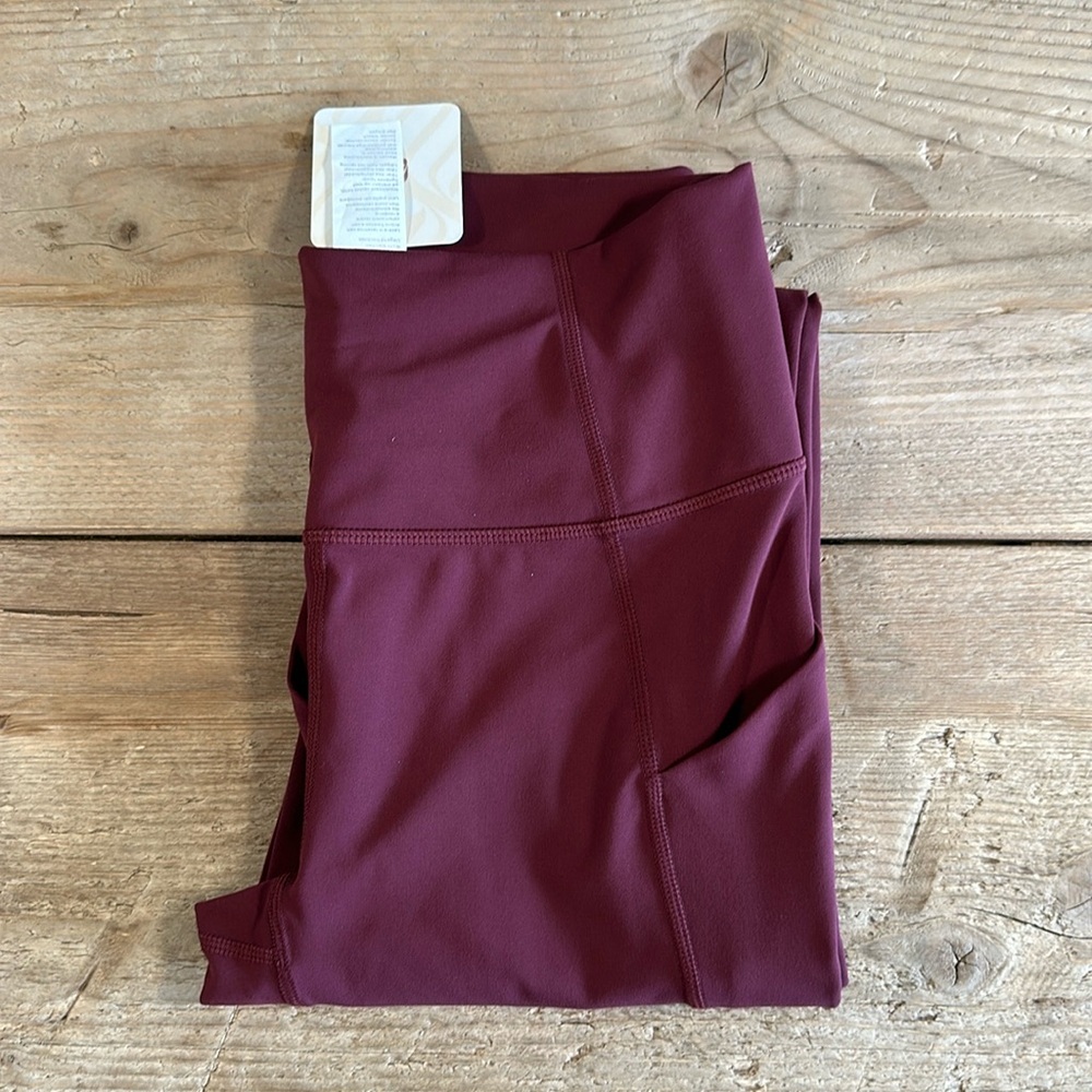 NWT- Fabletics Oasis Pureluxe HW Pocketed Kick Flare -MERLOT (32”) REG INSEAM - Picture 7 of 12